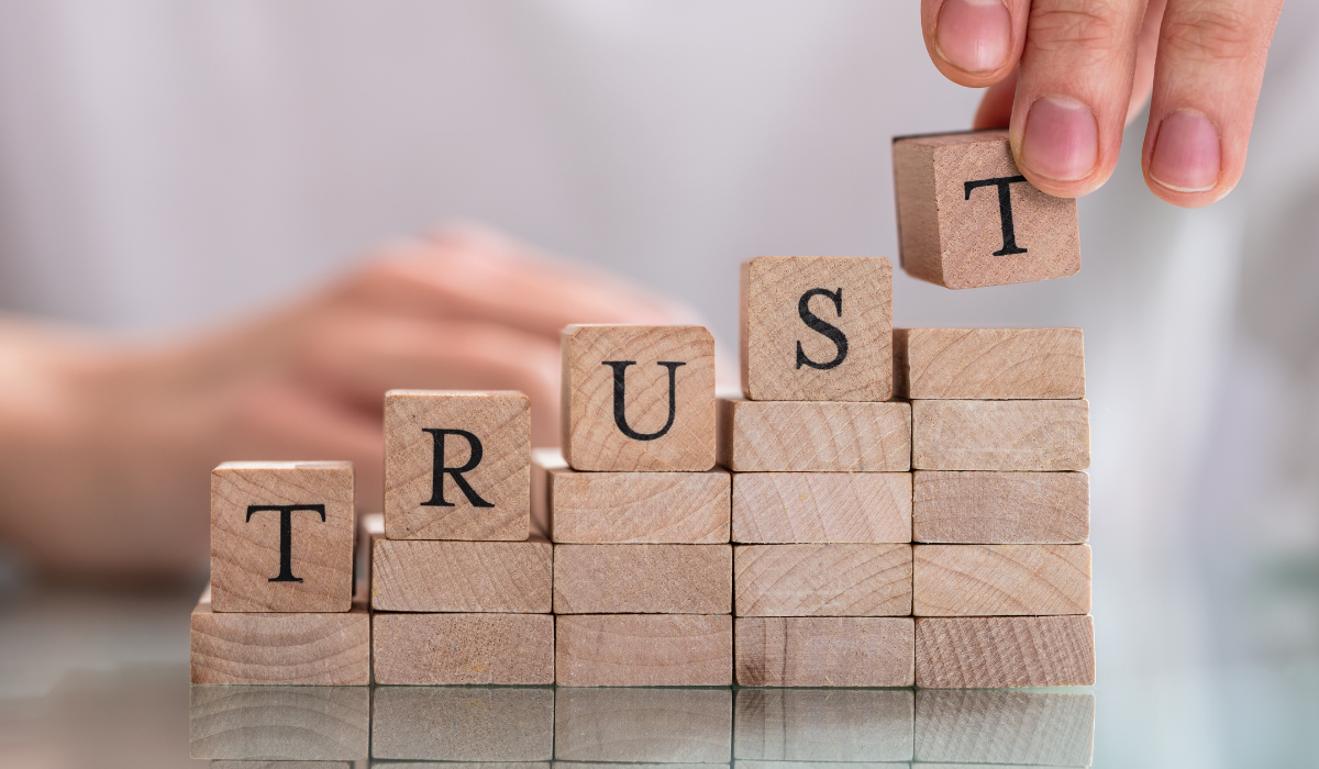 Image of Building blocks spelling Trust for blog article 9 Reasons Why Shopify Is Trustworthy by Milk Bottle Labs