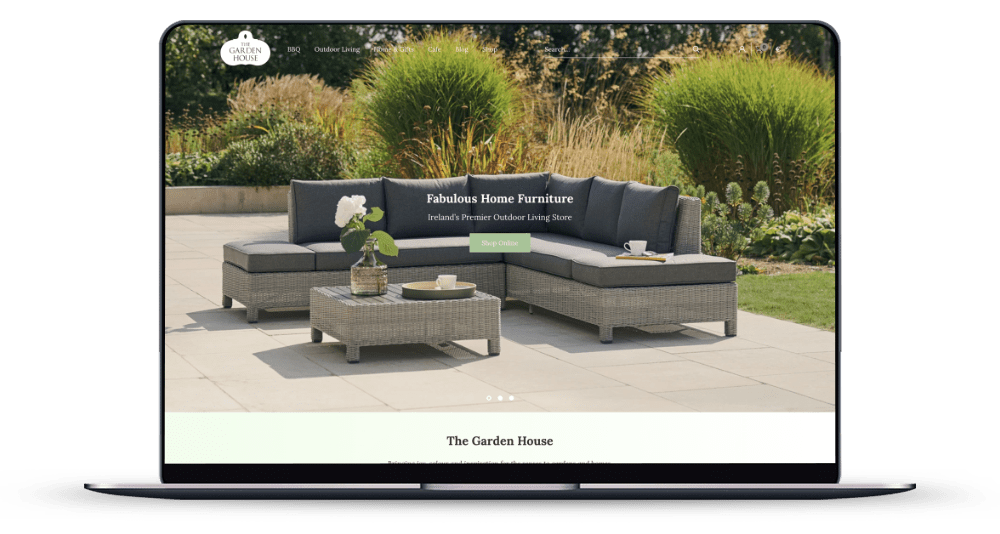 The Garden House Shopify store homepage on a laptop