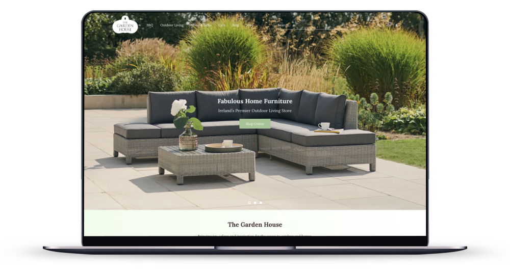 The Garden House Shopify store homepage on a laptop