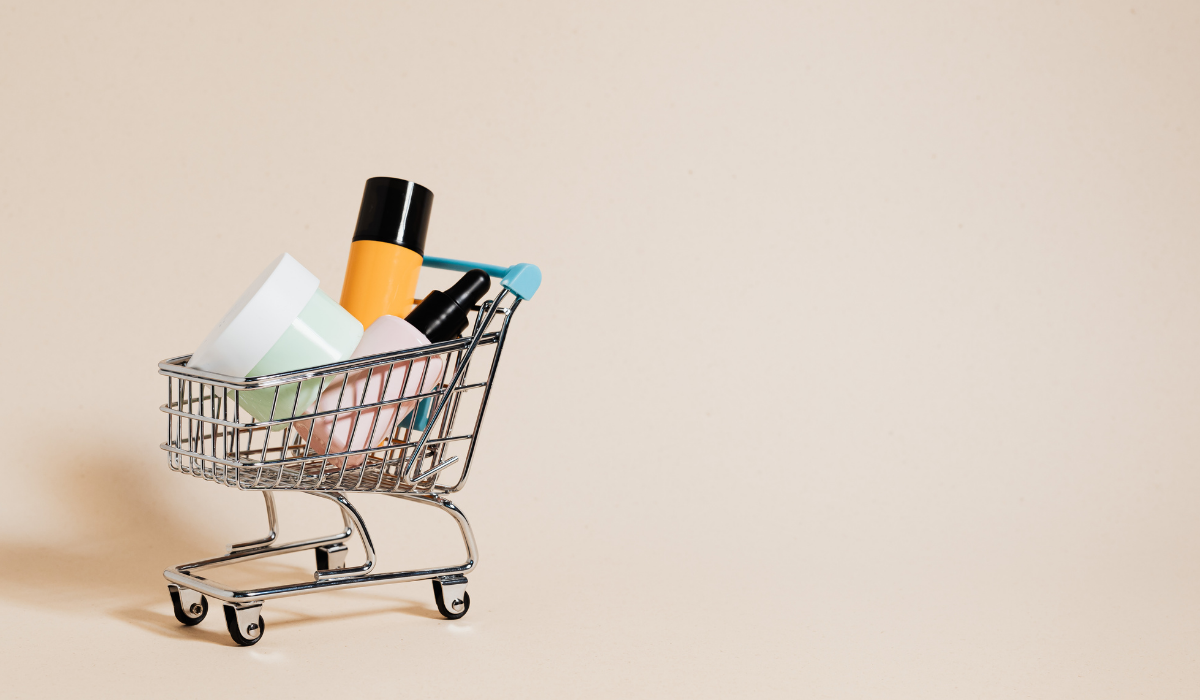 Banner image of shopping cart with products for blog article on cart abandonment on Shopify ecommerce stores.