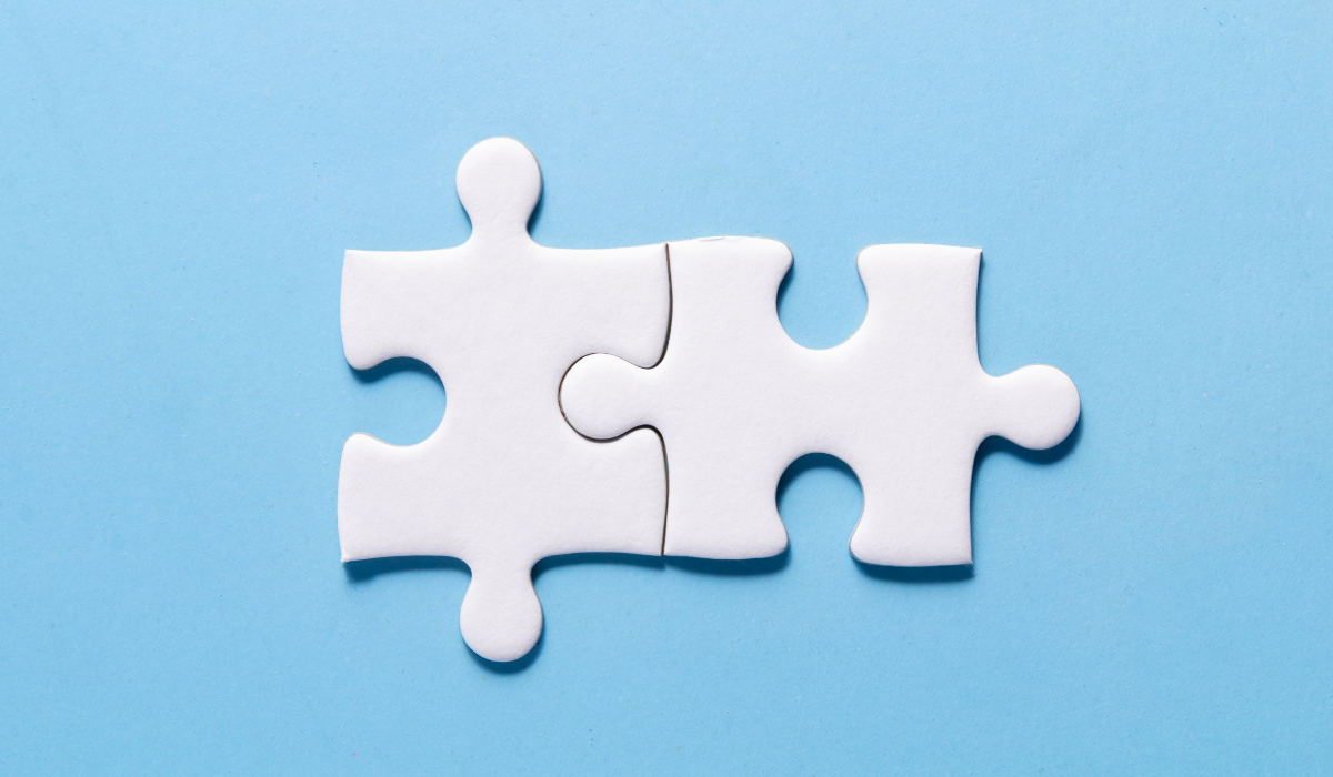 Jigsaw pieces on blue background