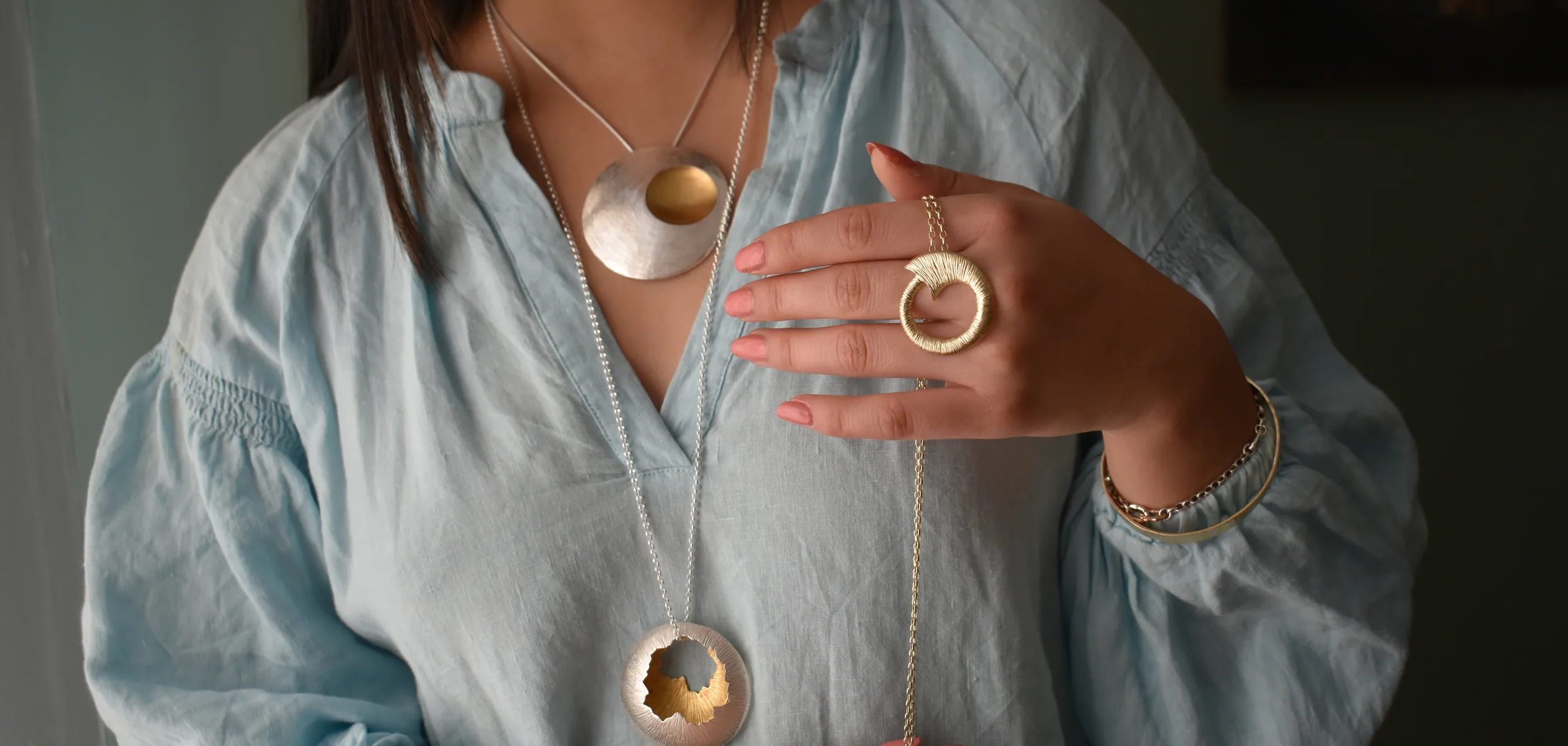 Martina Hamilton handcrafted silver and gold jewellery worn by a model
